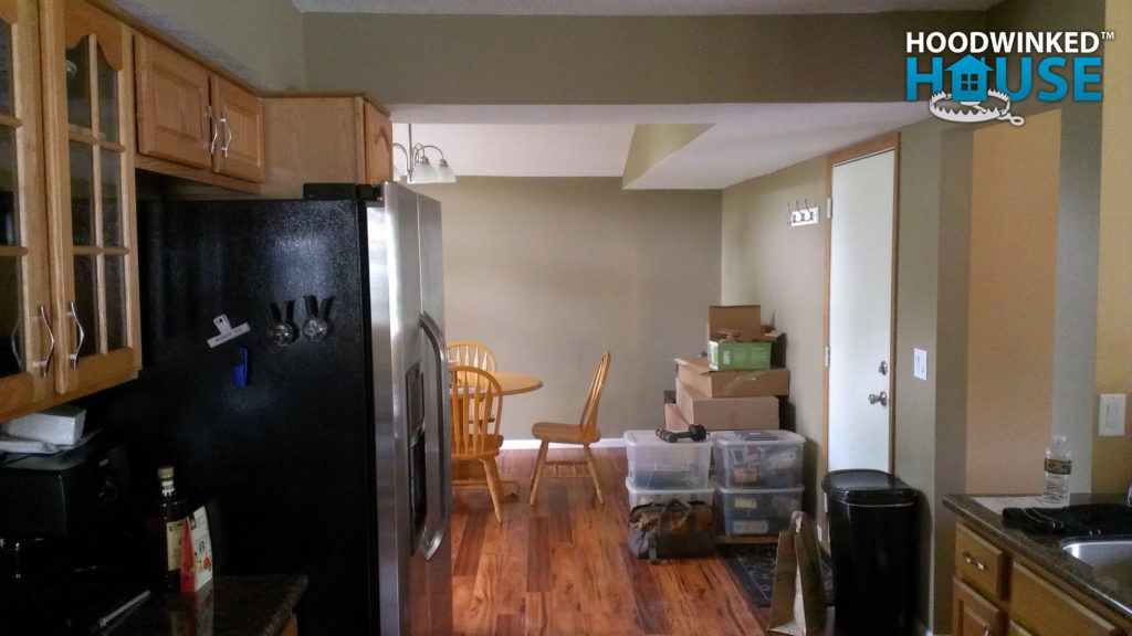 Kitchen with sink moved across the room and dining room without closet.