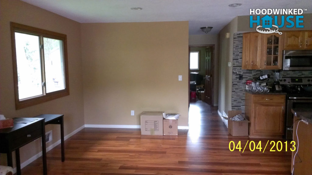 View of the same room but the kitchen wall has been removed.