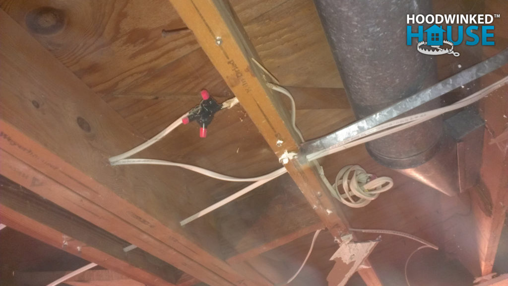 Wires spliced together without a required junction box.