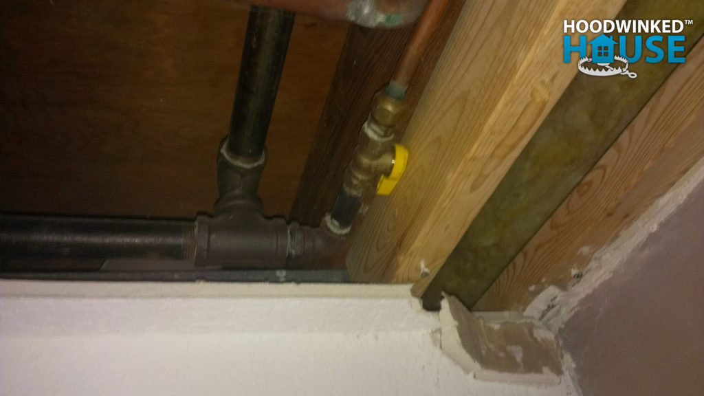 Gas shut-off valve between floor joists