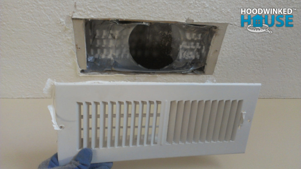 Heat register that has been spray painted in place.