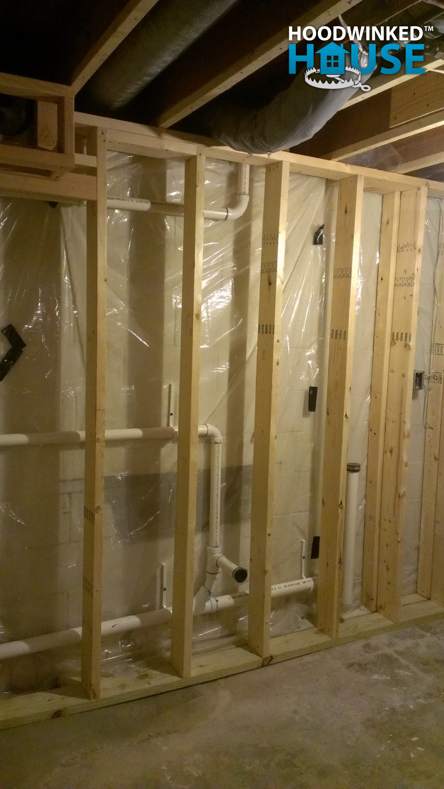 Framing in a basement over drain pipes.