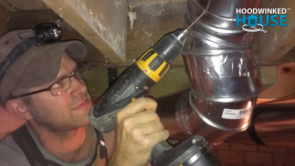 Using a drill when doing HVAC repairs in a house ruined by predatory remodeling.