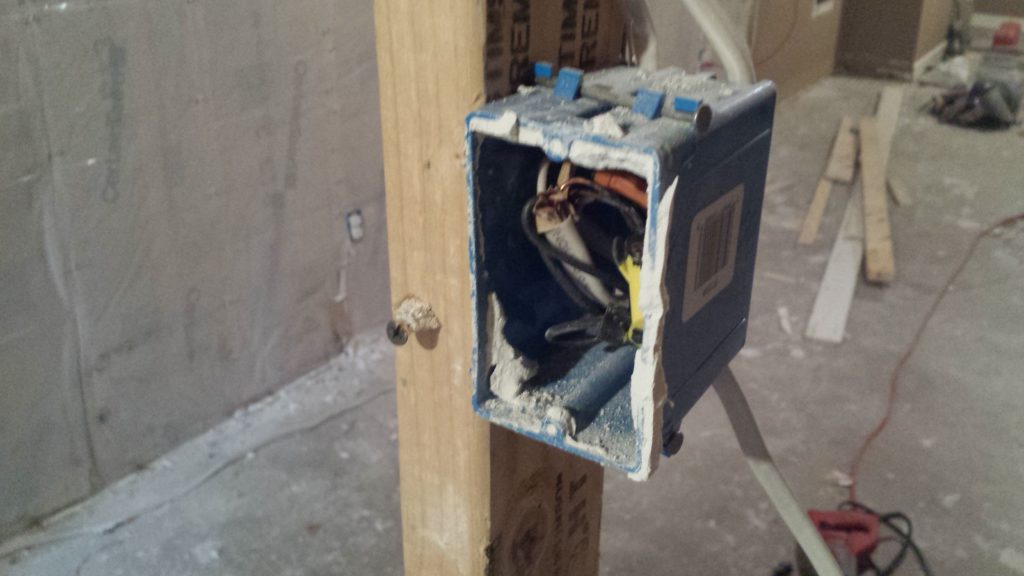 A junction box that was hidden behind drywall.