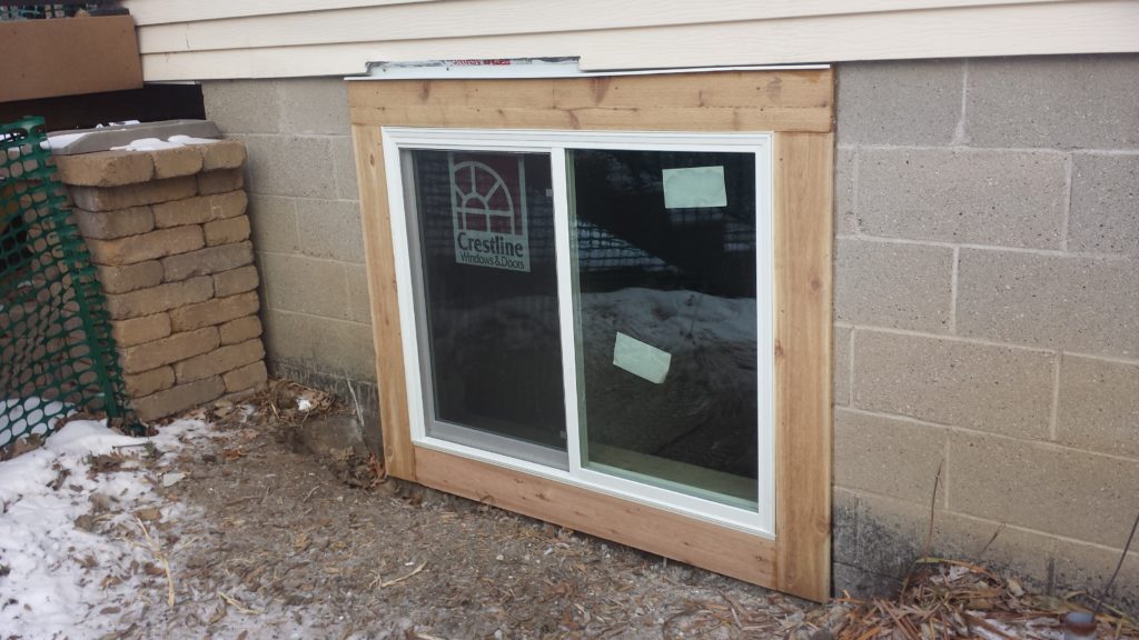 A new window is added to a basement.