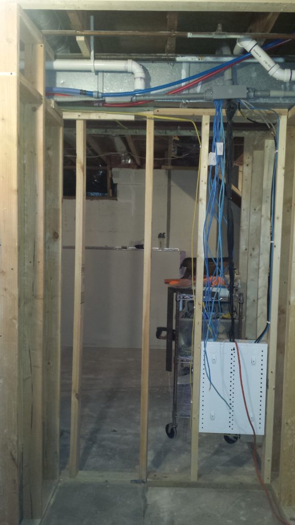 Stud walls in a basement.