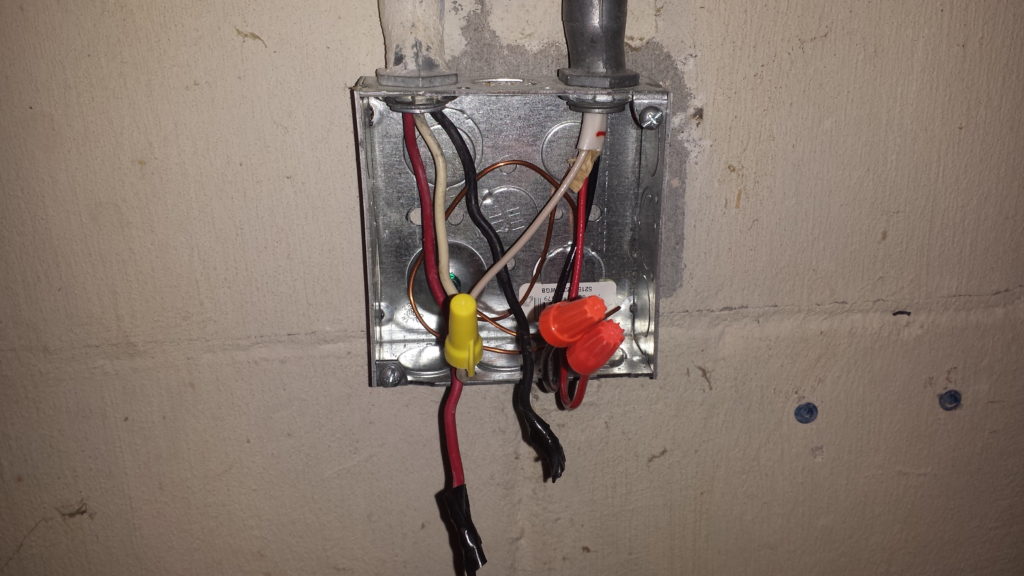 Junction box with wiring my electrician refuses to fix.