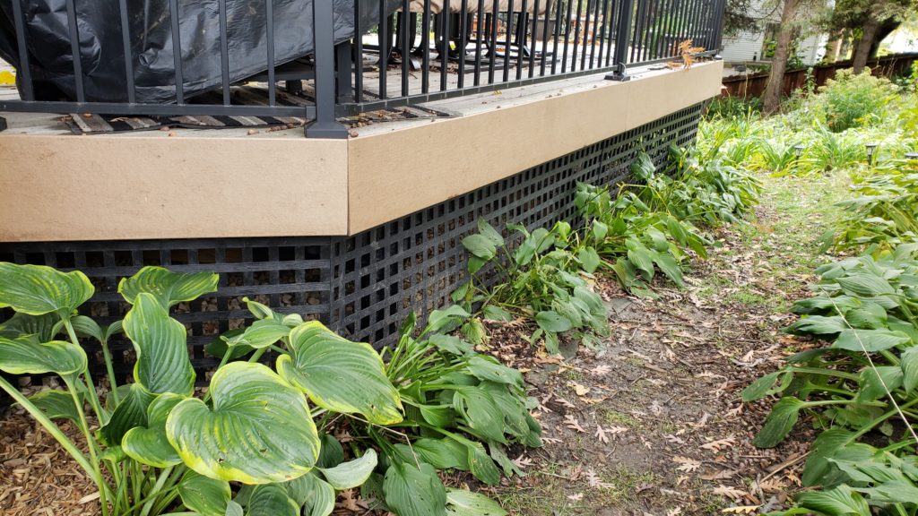 Lattice skirting around a deck.